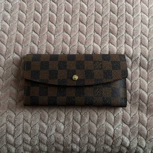 Louis Vuitton wallet. **See description**